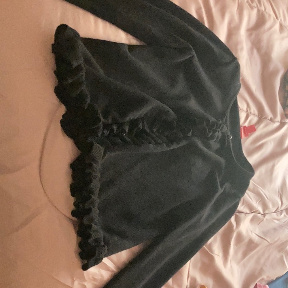 A black Jacket that goes over dresses
